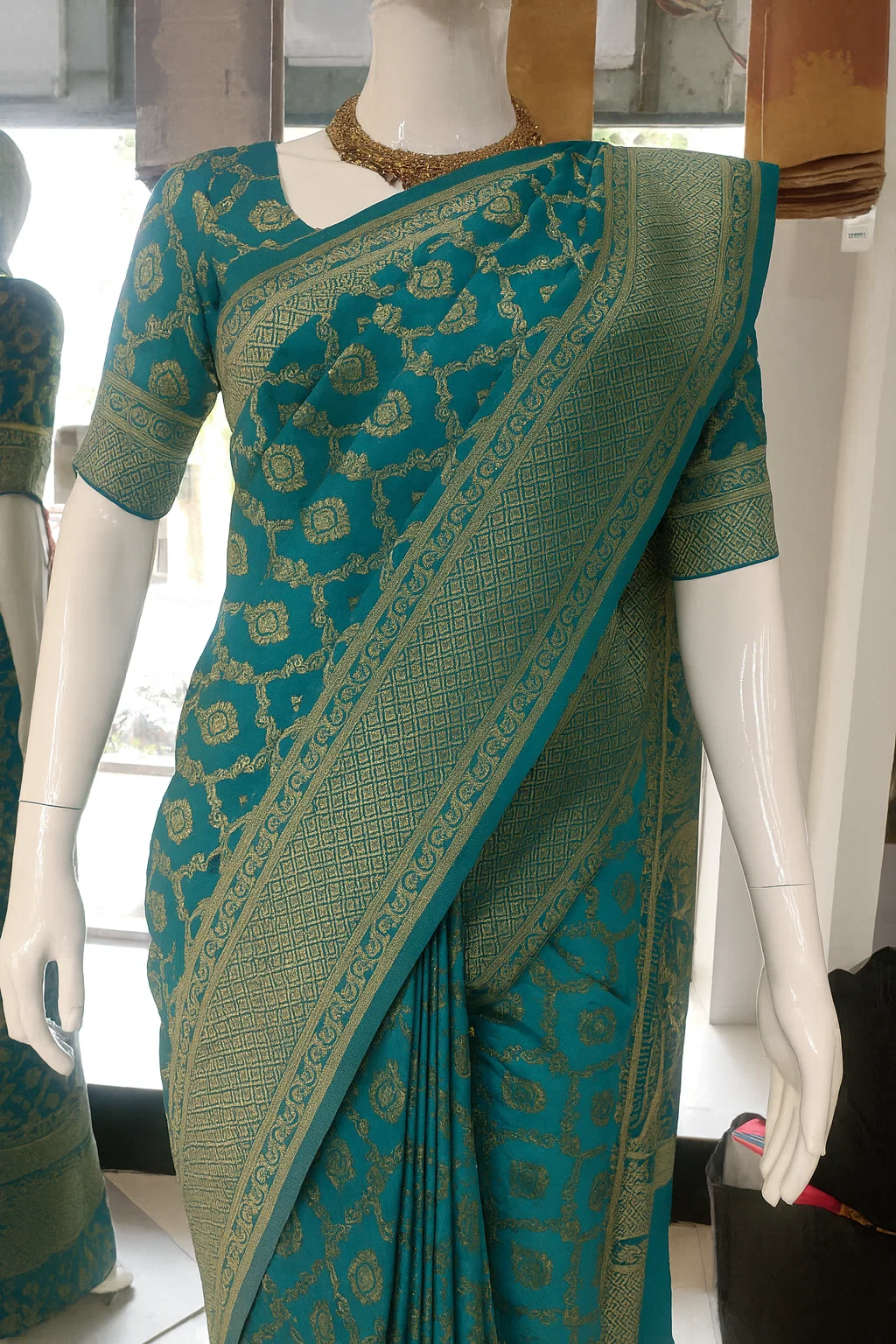 Emerald Green Banarasi Silk Saree with Intricate Golden Zari Floral Weaving